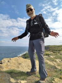 Senior Pilgrimage, Barney Gorin on a clifftop along El Camino de Santiago del Norte, photo by Riccardo