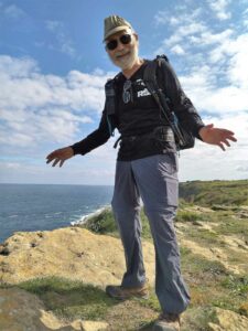 Senior Pilgrimage, Barney Gorin on a clifftop, El Camino de Santiago del Norte, photo by Riccardo, Senior Pilgrim