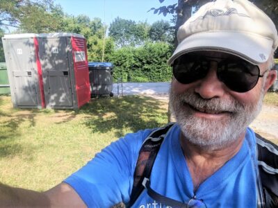 Selfie with portapotties in the background